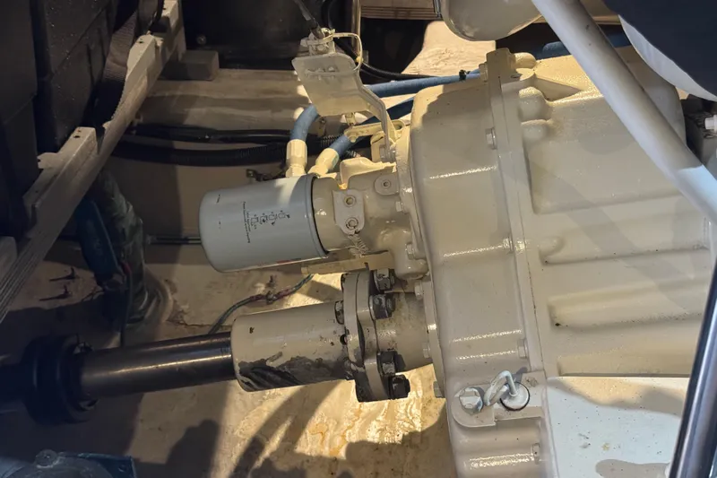 Once Around II Yacht Photos Pics Engine compartment of a 1998 Carver 530 Voyager Pilothouse, showcasing mechanical components.