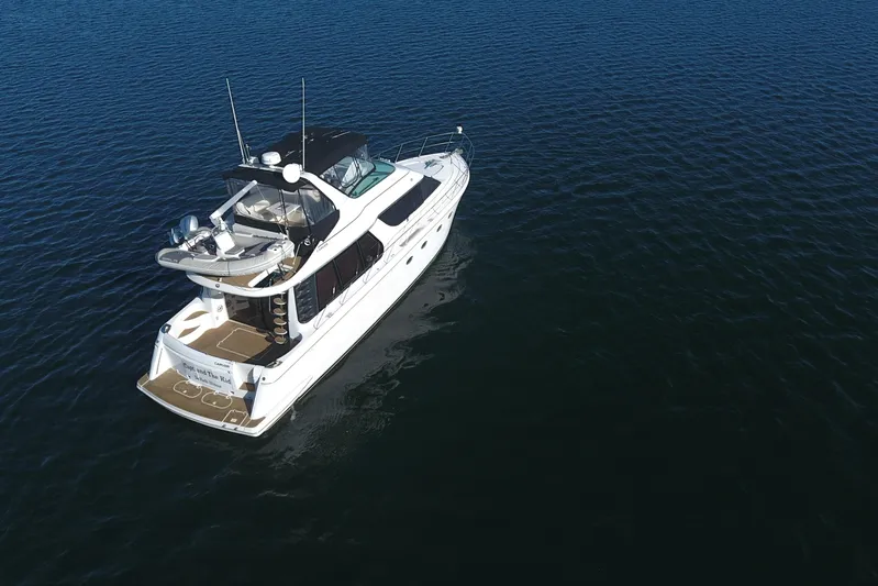Once Around II Yacht Photos Pics Aerial view of 1998 Carver 530 Voyager Pilothouse yacht on open water.