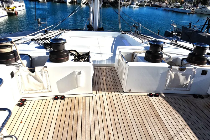  Yacht Photos Pics 2024 Lagoon 620 NEO yacht deck with winches and teak flooring in marina.