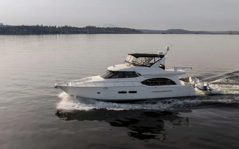 Persistence Yacht Photos Pics 2010 Meridian 580 Pilothouse yacht cruising on calm waters.