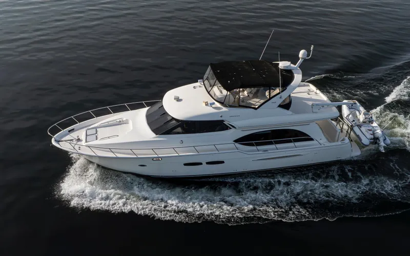 Persistence Yacht Photos Pics 2010 Meridian 580 Pilothouse yacht cruising on calm waters.