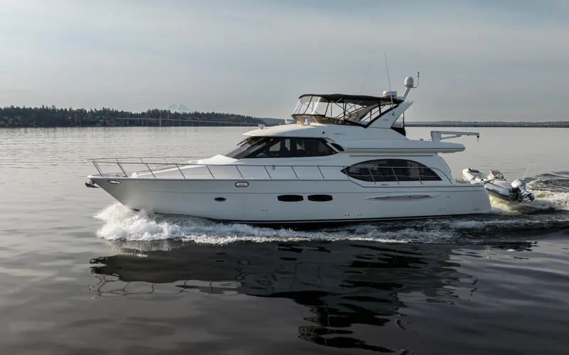 Persistence Yacht Photos Pics 2010 Meridian 580 Pilothouse yacht cruising on calm waters.