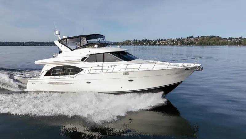Persistence Yacht Photos Pics 2010 Meridian 580 Pilothouse yacht cruising on calm waters.