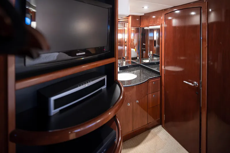 Persistence Yacht Photos Pics Luxurious interior of 2010 Meridian 580 Pilothouse with wood cabinetry and modern amenities.