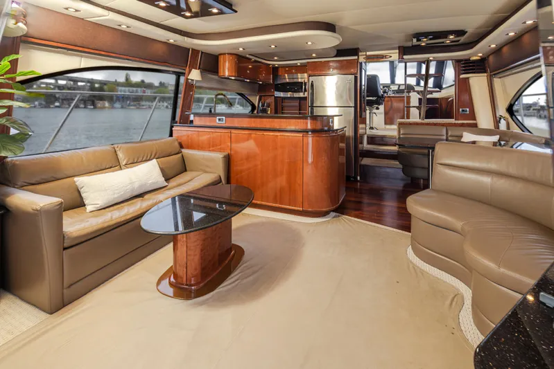 Persistence Yacht Photos Pics Luxurious interior of a 2010 Meridian 580 Pilothouse yacht with elegant furnishings.
