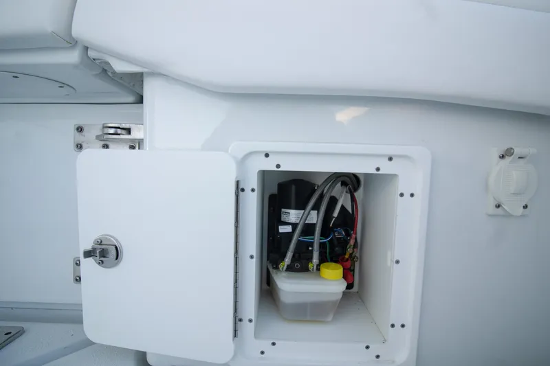  Yacht Photos Pics Open compartment on 2024 Yellowfin 39 boat showing internal wiring and components.