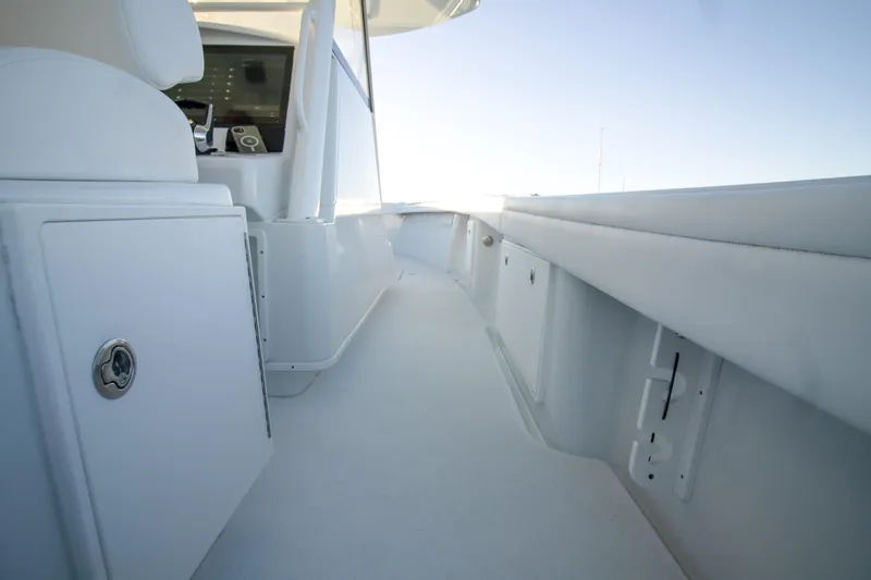  Yacht Photos Pics 2024 Yellowfin 39 boat interior with sleek white design and modern controls.
