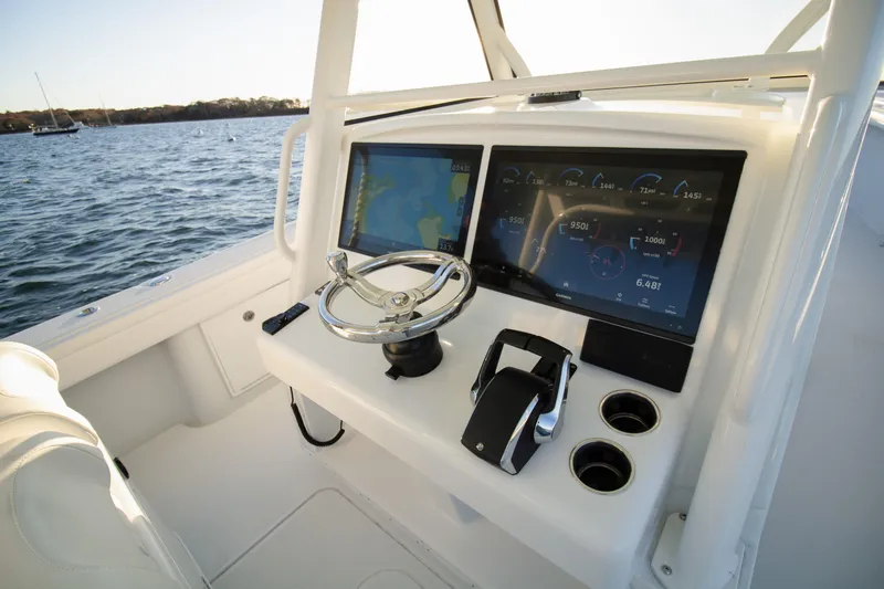  Yacht Photos Pics 2024 Yellowfin 39 boat dashboard with modern navigation and control systems.