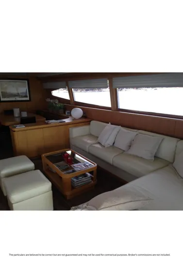  Yacht Photos Pics Luxurious interior of a 2005 Canados 86 Fly yacht with white leather seating.
