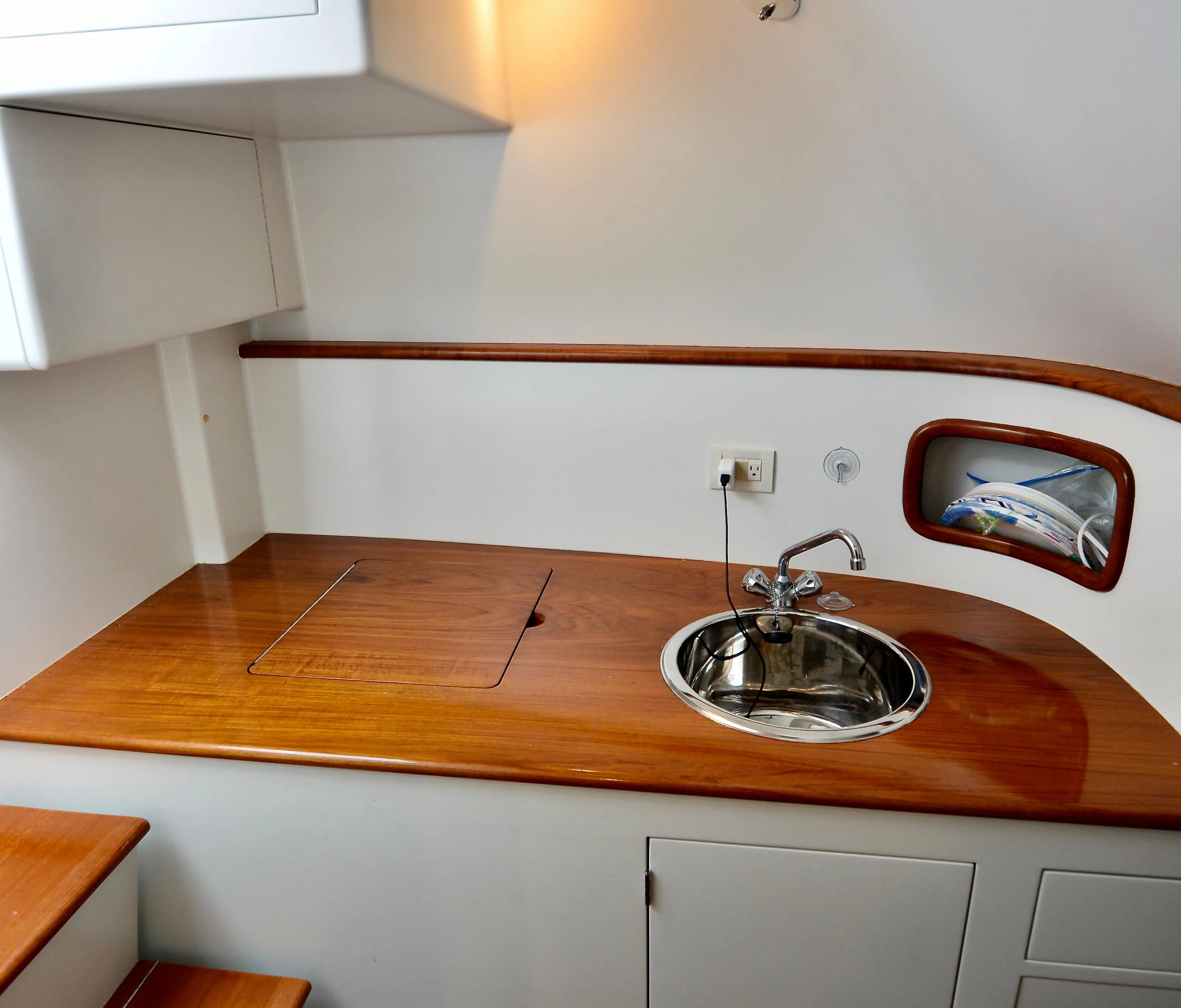2007 Gamefisherman 42 Walkaround interior with wooden countertop and sink.