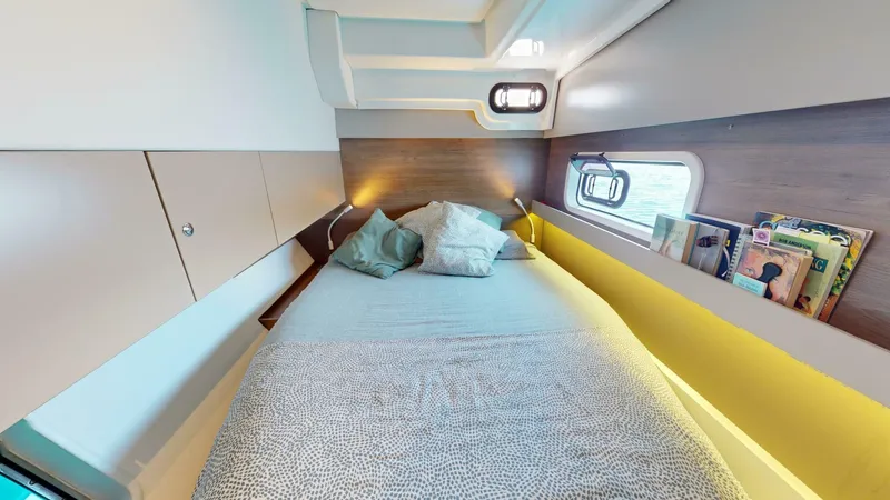 Aquatic Odyssey Yacht Photos Pics Luxurious cabin interior of 2022 Bali CATSPACE catamaran with cozy bed and modern design.