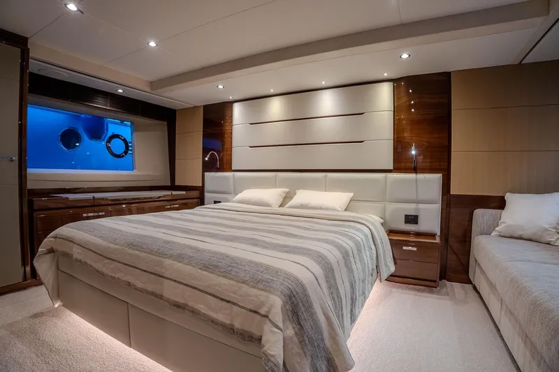 Dani Yacht Photos Pics Luxurious bedroom interior of 2016 Princess 68 yacht with elegant design and ambient lighting.