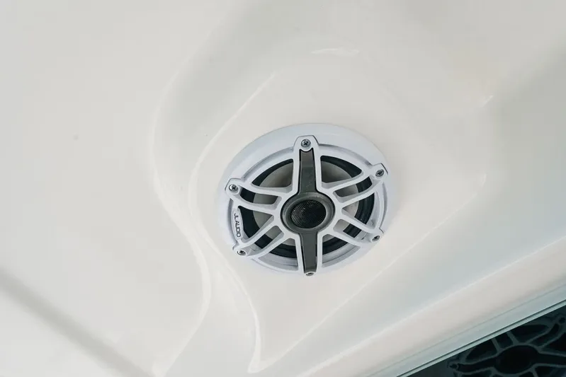 Caymas Yacht Photos Pics 2023 Caymas 401CC boat speaker detail on white surface.