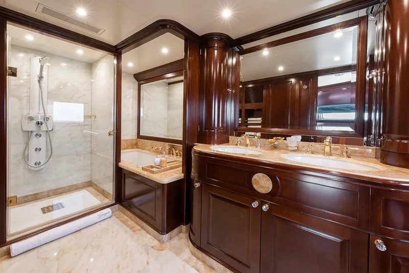 Georgia I Yacht Photos Pics Luxurious bathroom on 2009 Benetti Classic 120 yacht with marble and wood finishes.