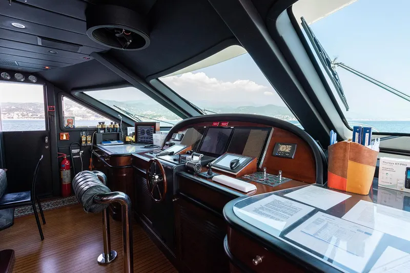 Georgia I Yacht Photos Pics Bridge interior of 2009 Benetti Classic 120 yacht with navigation equipment and sea view.