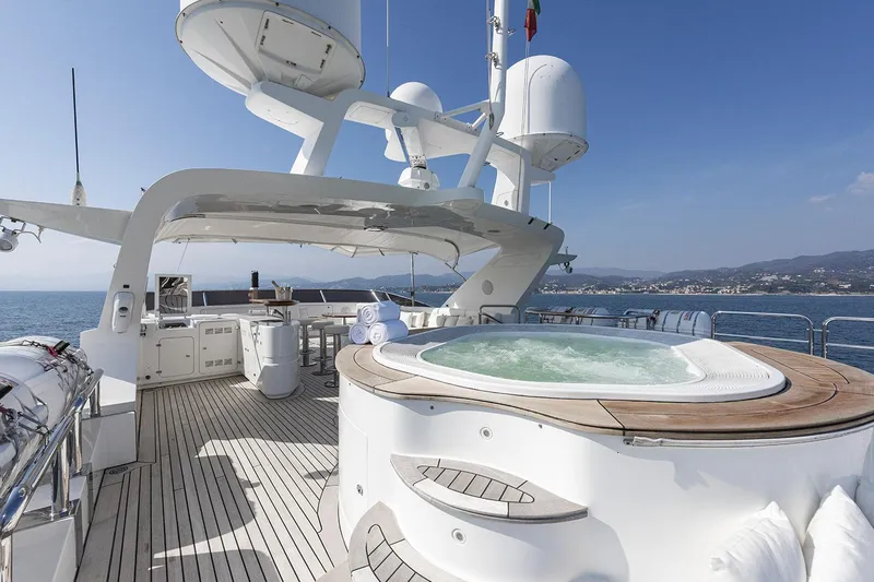 Georgia I Yacht Photos Pics Luxurious 2009 Benetti Classic 120 yacht deck with jacuzzi and ocean view.