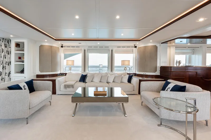 Georgia I Yacht Photos Pics Luxurious interior of 2009 Benetti Classic 120 yacht, featuring elegant seating and ocean views.