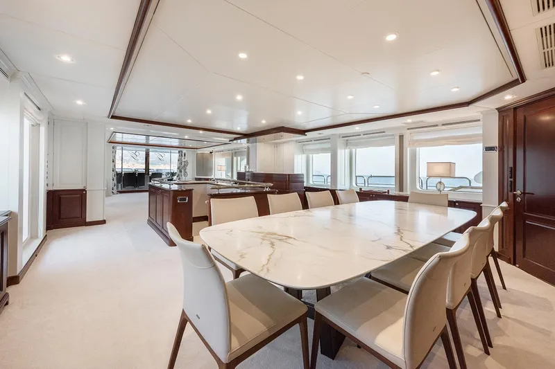 Georgia I Yacht Photos Pics Luxurious interior of 2009 Benetti Classic 120 yacht with elegant dining area and modern design.