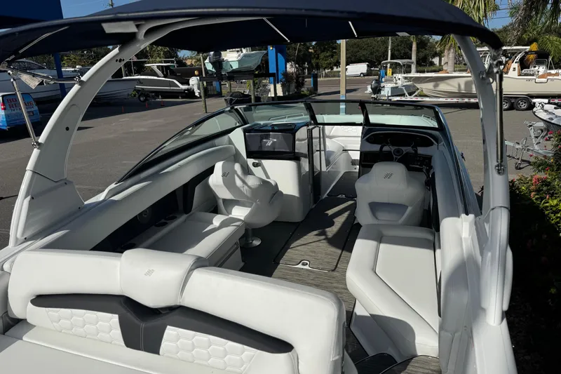  Yacht Photos Pics 2026 Four Winns HD8 OB boat interior with white seating and modern design.