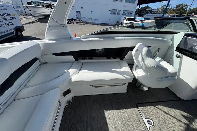  Yacht Photos Pics 2026 Four Winns HD8 OB boat interior with white seating and modern design.
