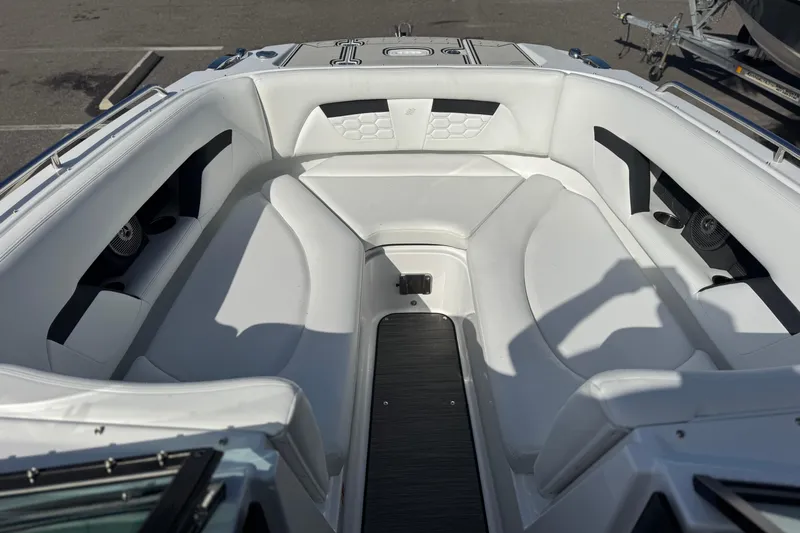  Yacht Photos Pics 2026 Four Winns HD8 OB boat interior with white seating and modern design.