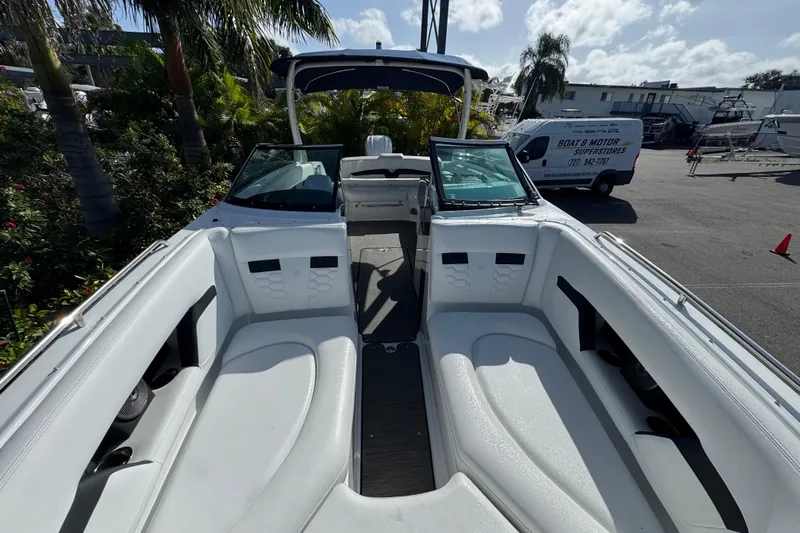  Yacht Photos Pics 2026 Four Winns HD8 OB boat interior with white seating and open windshield.