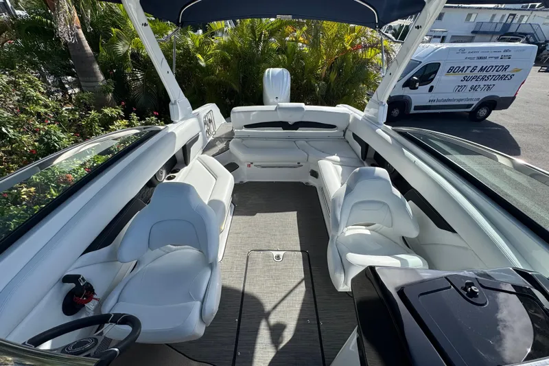  Yacht Photos Pics 2026 Four Winns HD8 OB boat interior with white seating and modern design.