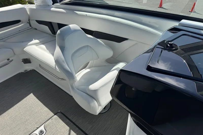  Yacht Photos Pics 2026 Four Winns HD8 OB boat interior with white seating and sleek design.