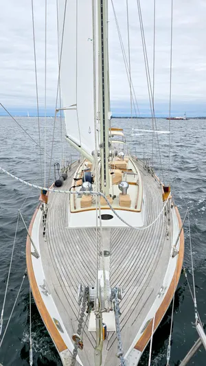 Victoria Yacht Photos Pics 1983 Cherubini Schooner sailing on open water, showcasing elegant wooden deck design.