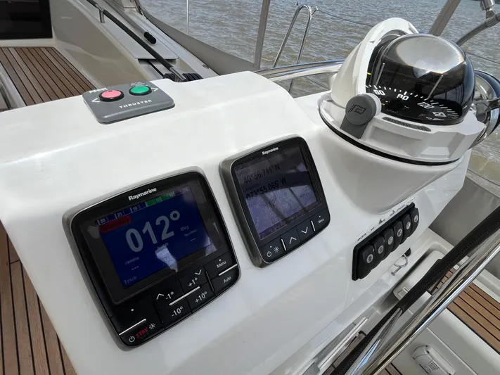 Kilimanjaro Yacht Photos Pics Control panel of a 2012 Beneteau Oceanis 58 yacht with navigation instruments.
