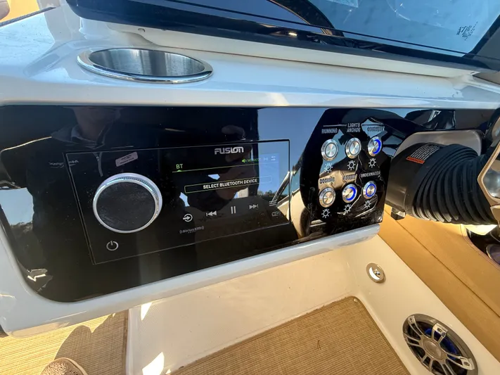  Yacht Photos Pics Control panel of 2023 Sea Ray 280 SLX boat with audio system and switches.