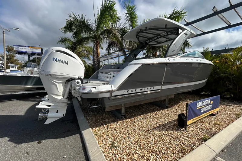  Yacht Photos Pics 2026 Four Winns H9 OB boat with Yamaha engine displayed outdoors.