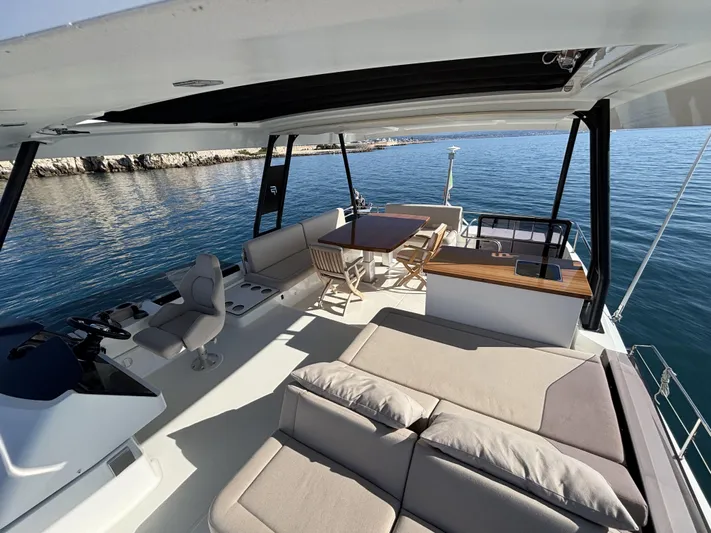 Barcajack Yacht Photos Pics Luxurious 2022 Fountaine Pajot MY6 yacht with spacious deck and seating area.