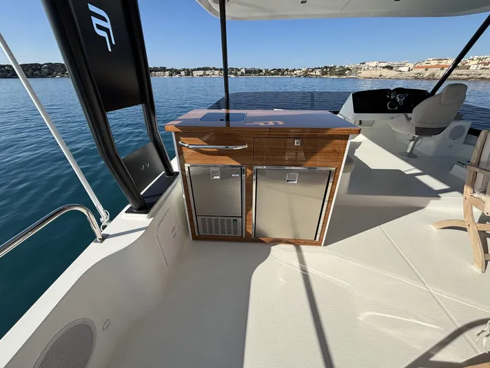 Barcajack Yacht Photos Pics Luxury deck of 2022 Fountaine Pajot MY6 yacht with modern amenities.