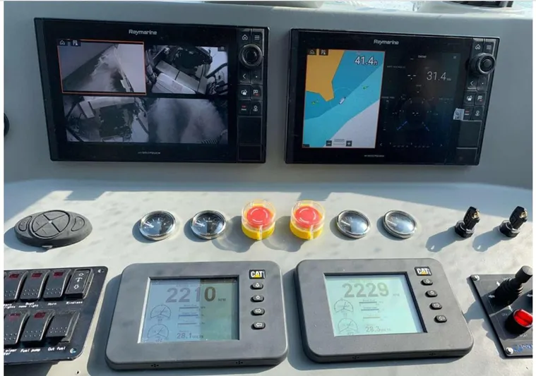  Yacht Photos Pics Control panel of 2025 Mazarin Catamaran HSF-58 with navigation and monitoring screens.