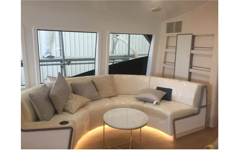  Yacht Photos Pics Luxurious interior of 2025 Mazarin Catamaran HSF-58 with plush seating and modern decor.