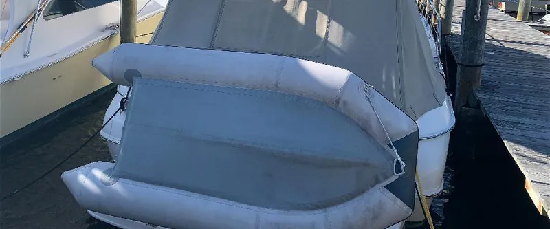  Yacht Photos Pics 2003 Sea Ray 400 Sedan Bridge docked with protective cover.