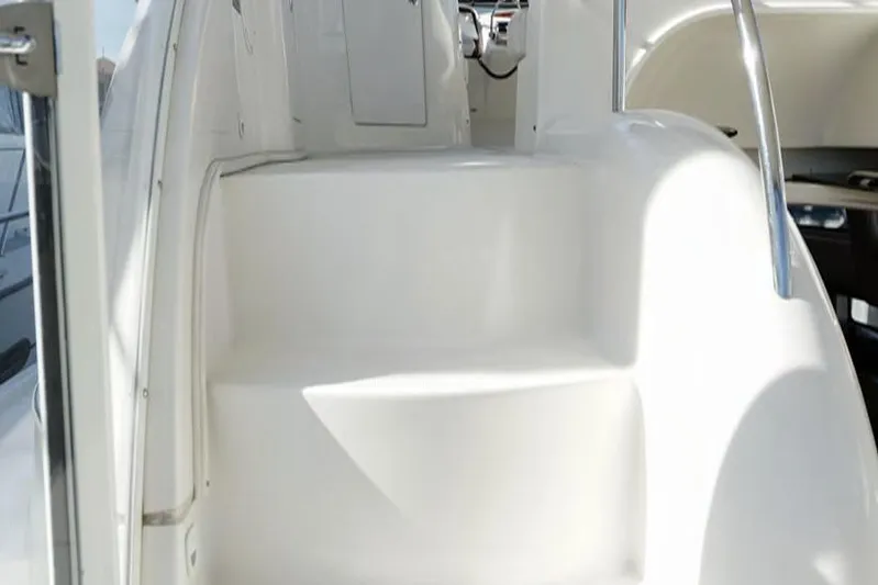 Blue Yonder Yacht Photos Pics Staircase on 2004 Meridian 459 Motoryacht, featuring sleek white design and stainless steel handrails.