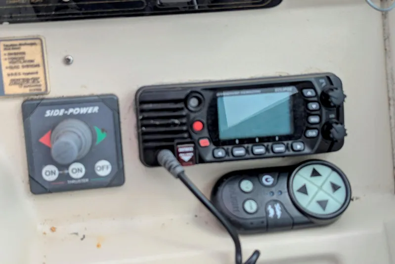  Yacht Photos Pics Control panel of a 2000 Cruisers Yachts 3870 Express with navigation and thruster controls.