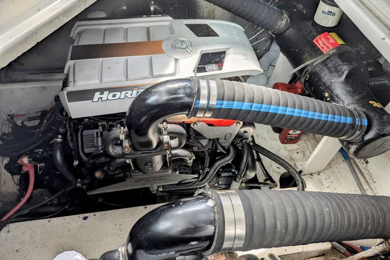  Yacht Photos Pics Engine compartment of 2000 Cruisers Yachts 3870 Express, featuring Horizon engine components.