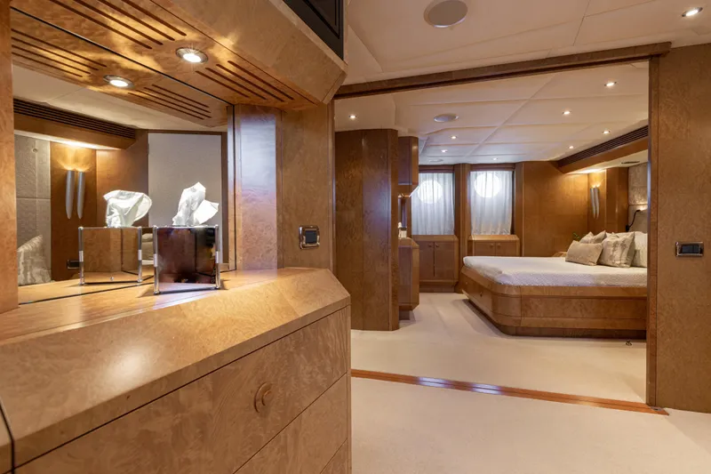 Benita Blue Yacht Photos Pics Luxurious 2005 Evolution Yachts Custom interior with elegant wood finishes and modern lighting.