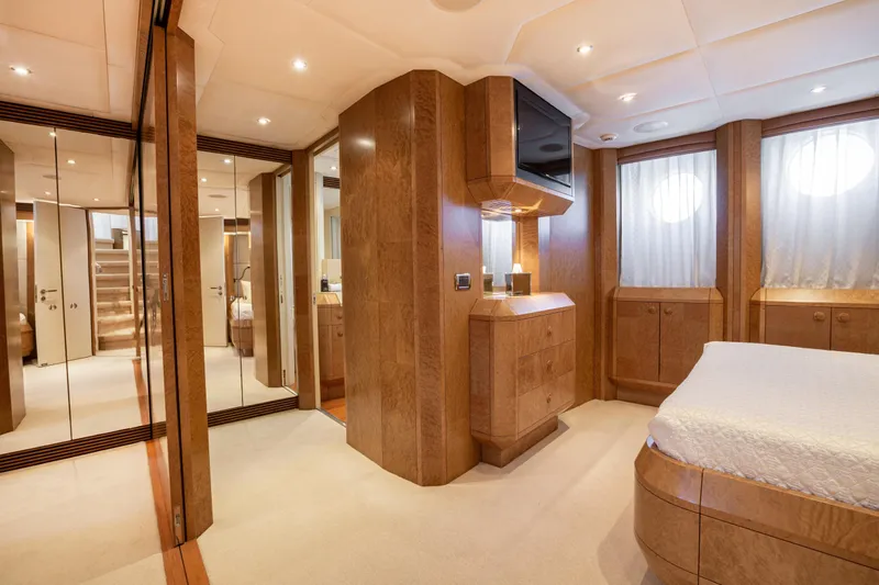 Benita Blue Yacht Photos Pics Luxurious 2005 Evolution Yachts Custom interior with wood finishes and modern amenities.