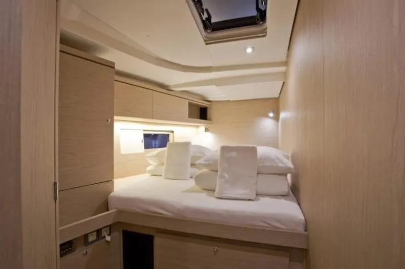 Miss Alice Yacht Photos Pics Luxurious cabin interior of 2018 Beneteau 51.1 yacht with modern wood finish.