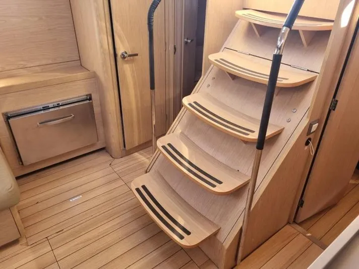 Miss Alice Yacht Photos Pics Interior of 2018 Beneteau 51.1 yacht with wooden stairs and modern design.