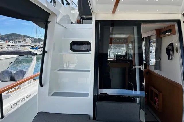  Yacht Photos Pics Targa 37 boat interior, 2022 model, featuring sleek design and modern amenities at a marina.