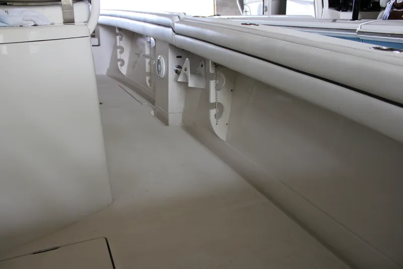  Yacht Photos Pics 2018 Jupiter 30 HFS boat interior with sleek white seating and storage compartments.