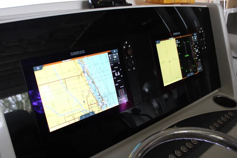  Yacht Photos Pics Simrad navigation displays on 2018 Jupiter 30 HFS boat dashboard.