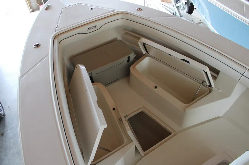  Yacht Photos Pics 2018 Jupiter 30 HFS boat interior with open storage compartments.