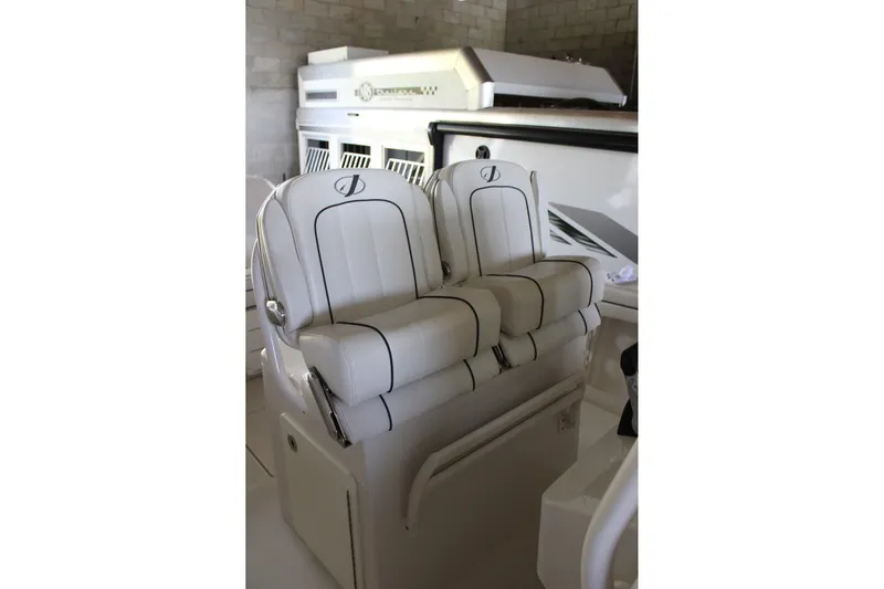  Yacht Photos Pics 2018 Jupiter 30 HFS boat interior with luxurious white seating and sleek design.