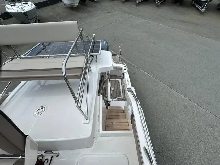  Yacht Photos Pics 2025 Cutwater C-32 CB boat, top view, docked with visible deck and seating area.